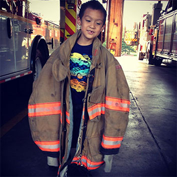 Damien wearing Firefighter gear