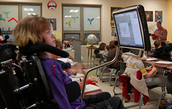 Lianna using her Tobii device