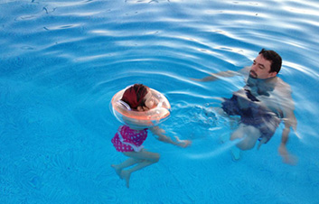 Lianna and Uncle in pool