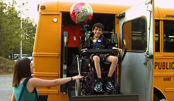 Colin exiting the school bus