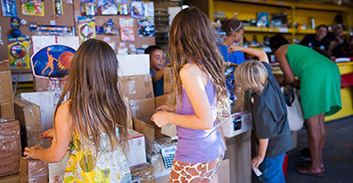 Kids waiting for Caine outside the store