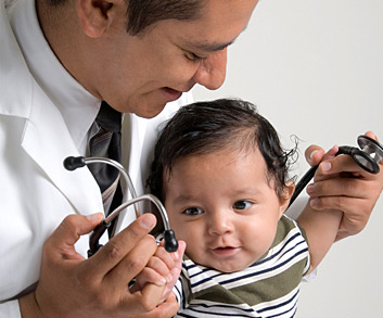 doctor checking child’s reflex